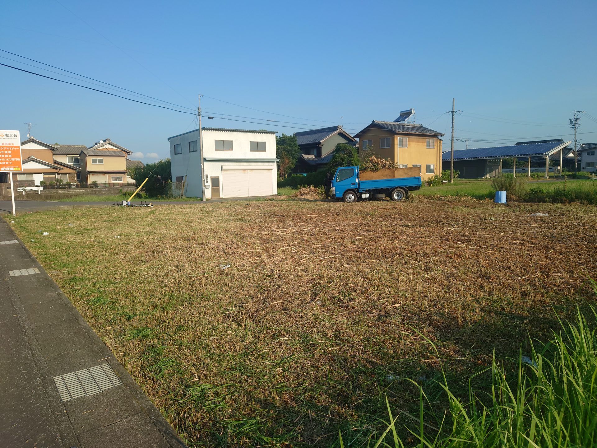 息子と草刈り作業